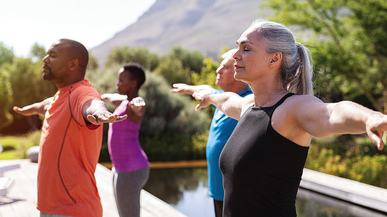 Image of people stretching their arms